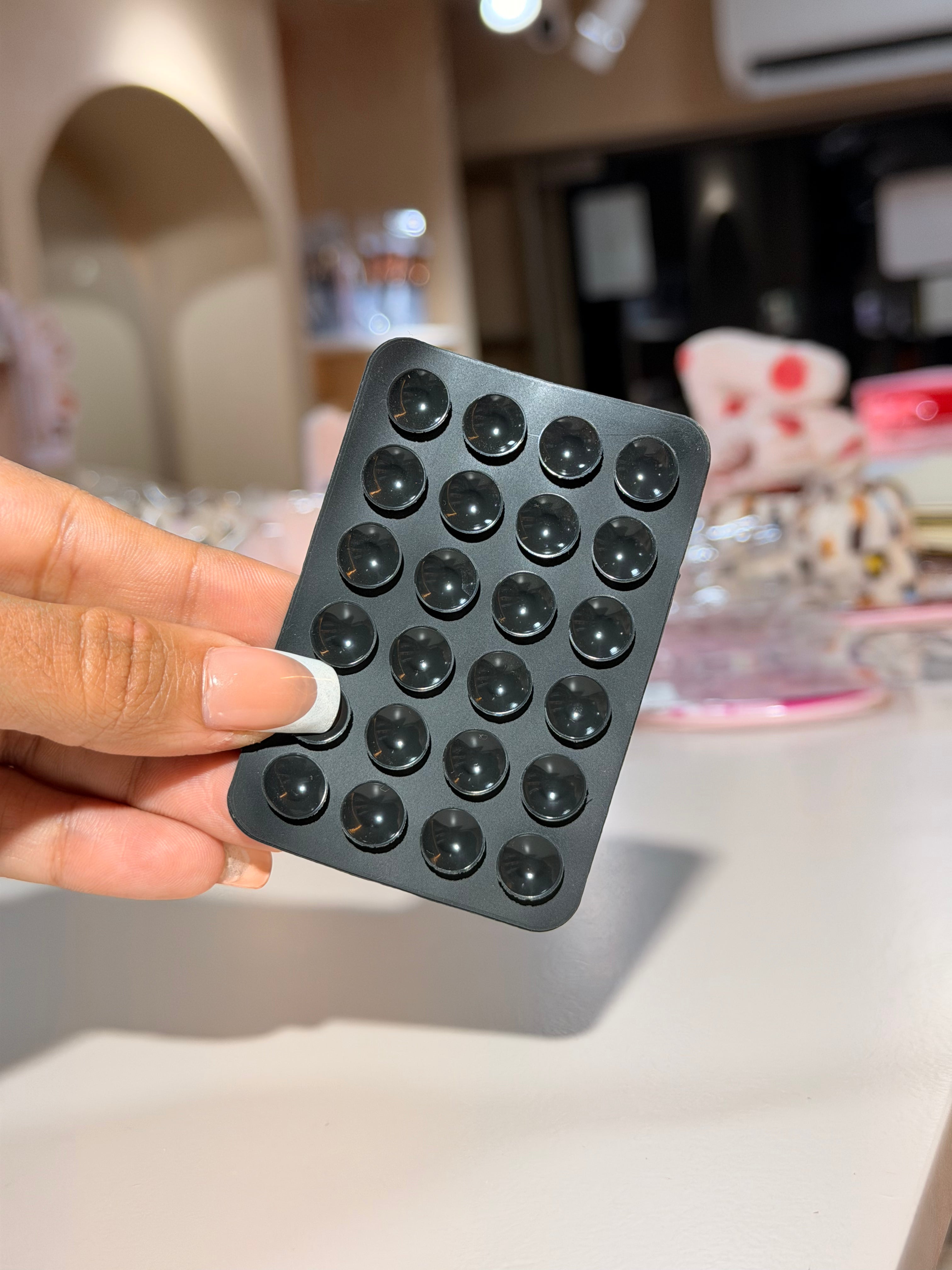 Soporte adhesivo para celular